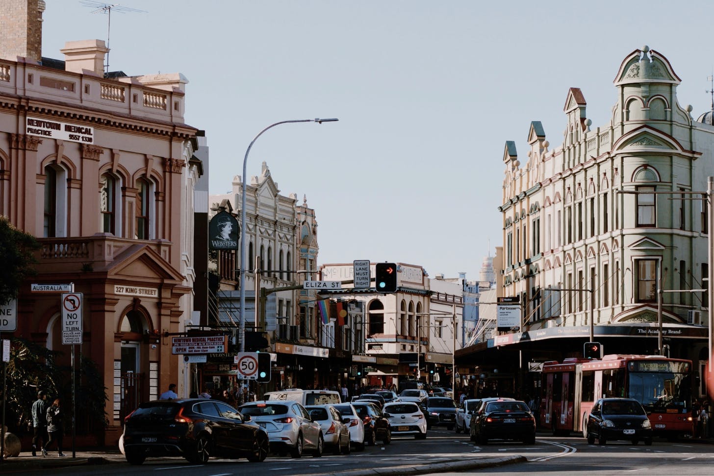 a busy street with cars driving