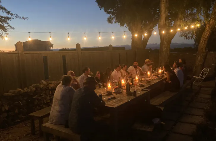 Dining al fresco under fairy lights at Cambridge Road Vineyard