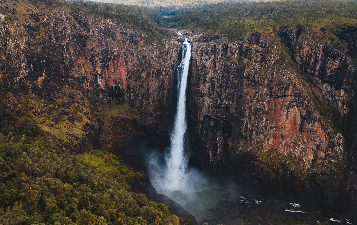 Aerial image of a steep waterfall surrounded by rock