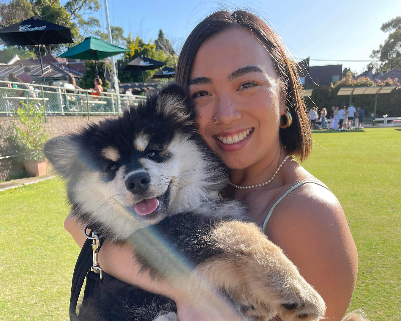 Bernie Nguyen holding a cute dog