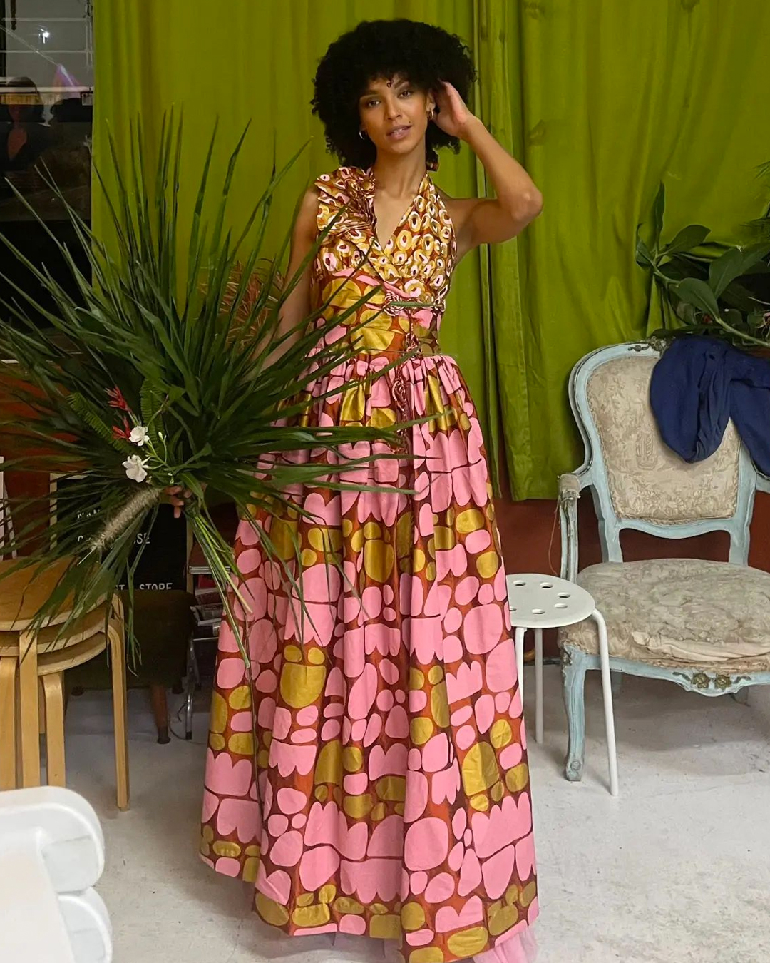 a person wearing a frock and posing