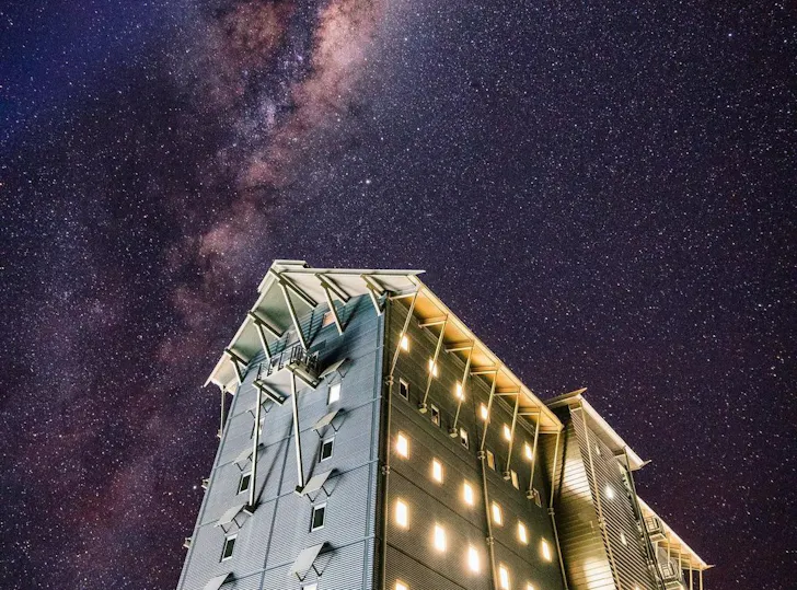 a close up of a hotel at night