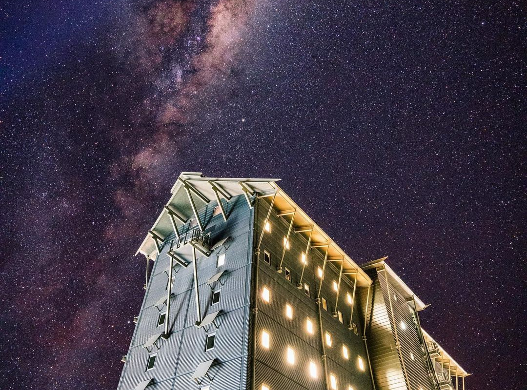 a close up of a hotel at night