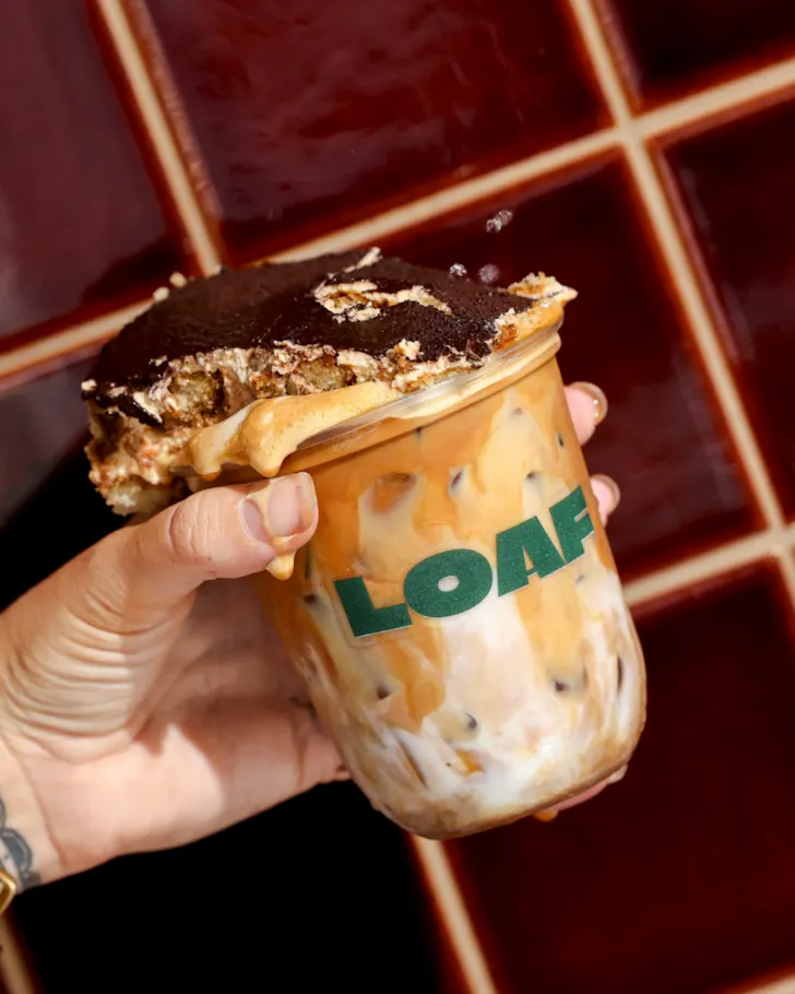 Iced coffee with tiramisu on top 