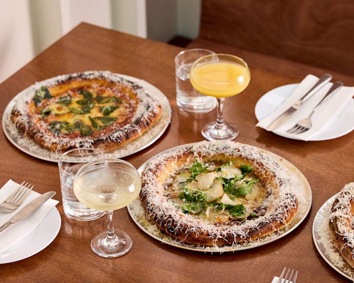 Pizza and drinks at happy hour at Norma Taps