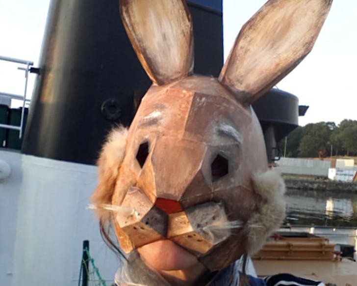 Person wearing a clever cardboard rabbit mask. One of the most eco-friendly and best Halloween costumes ideas. 