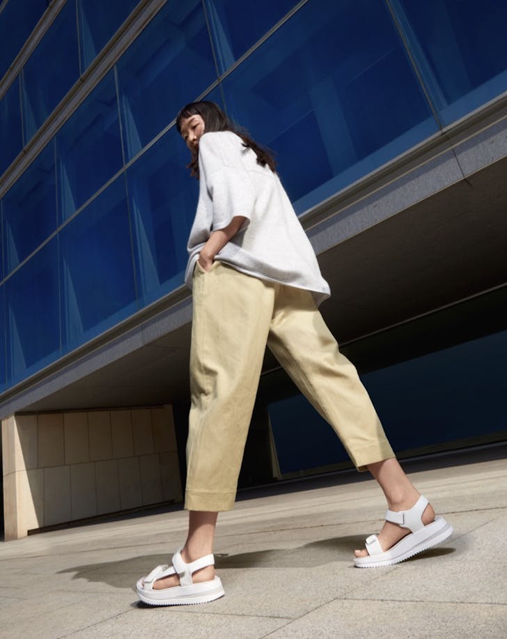 Woman wearing FitFlop slides