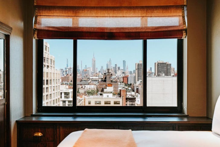 SoHo Grand Hotel bedroom suite overlooking New York City