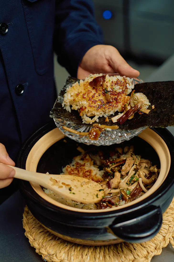 a clay pot with rice