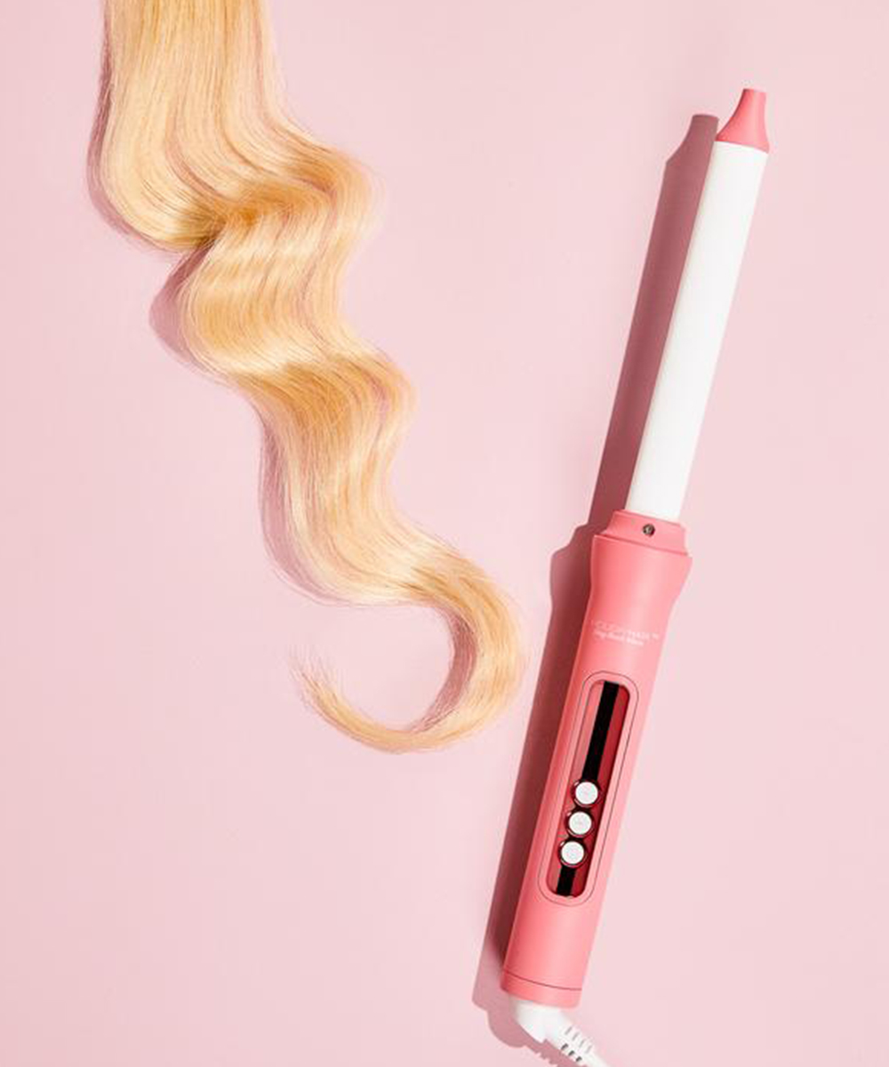 a pink curling wand