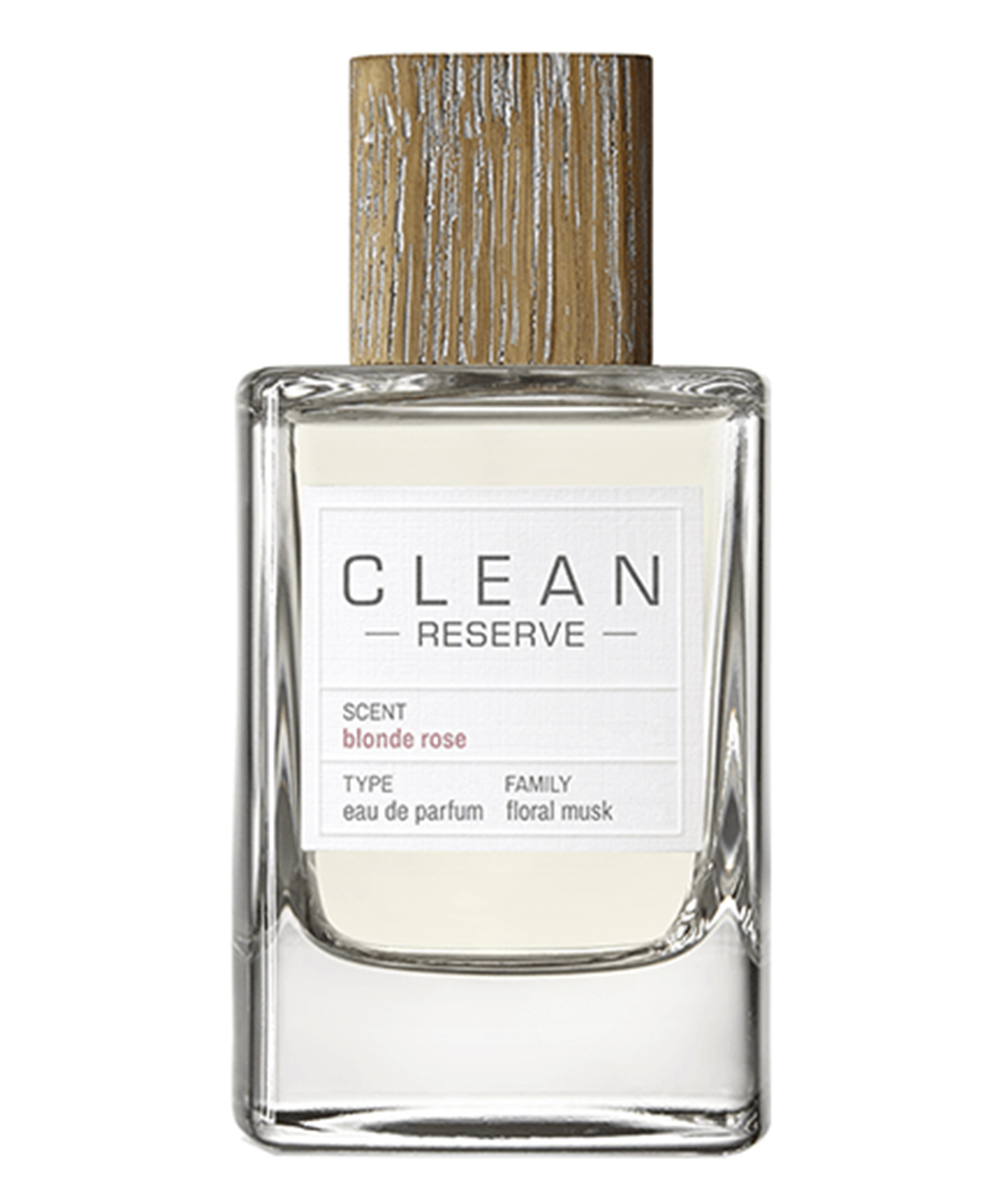 a clear perfume bottle with a white label.