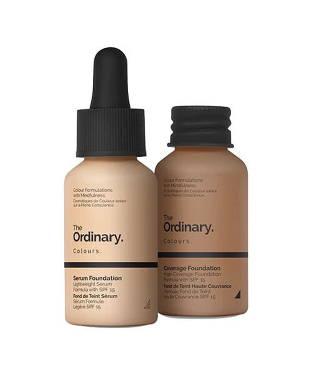 two small bottles of foundation with black lids