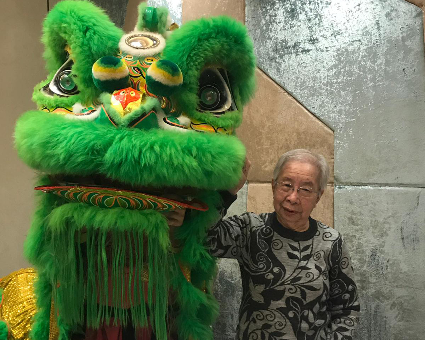 Wendy Ma's grandma with a lion dancer