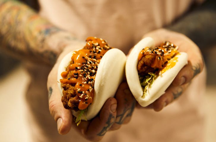 hand holding bao buns