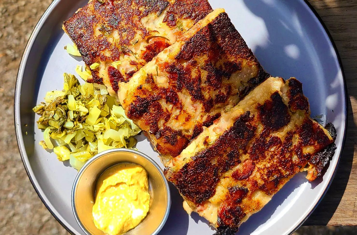 halloumi on a pan with butter and chives