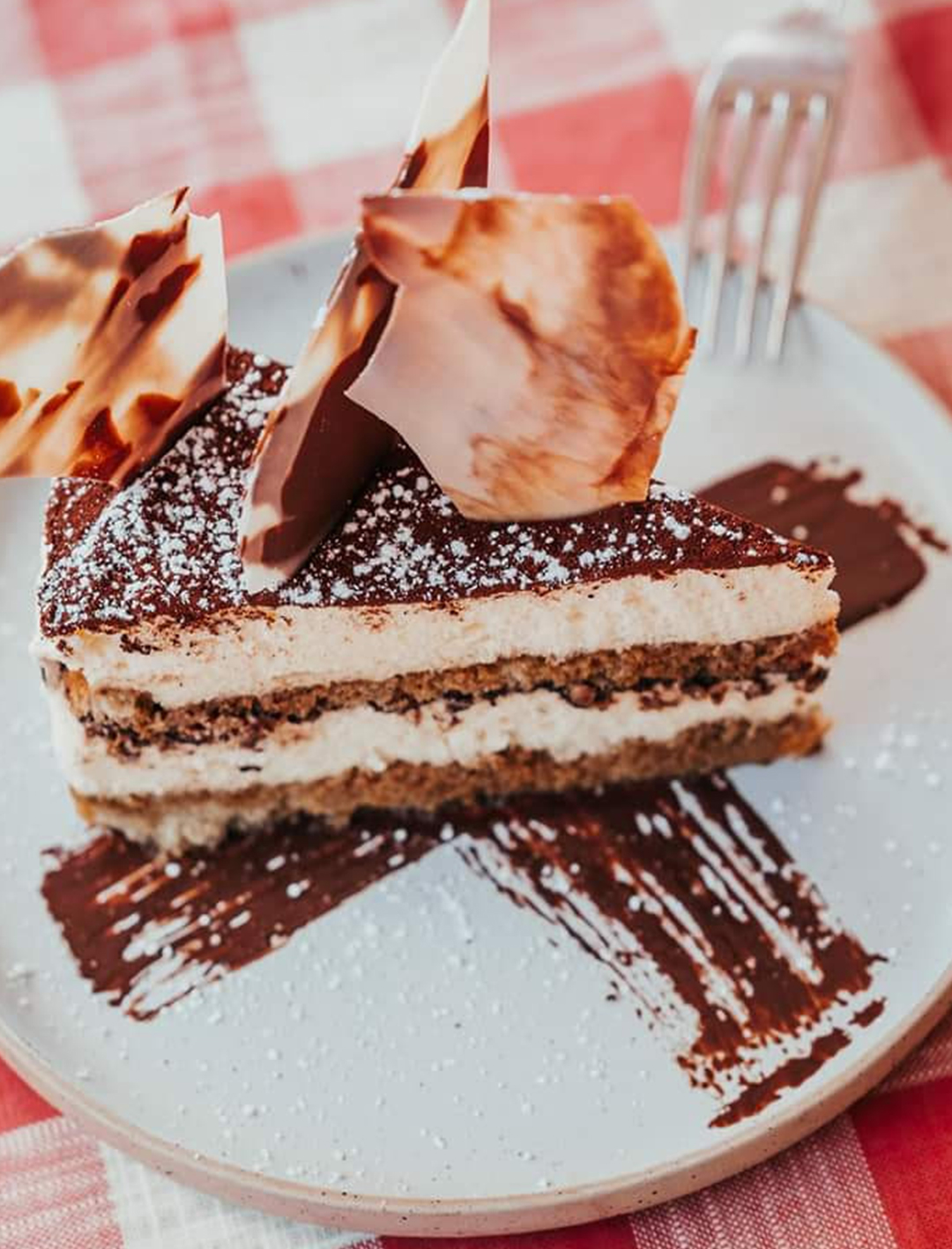 slice of tiramisu cake on plate