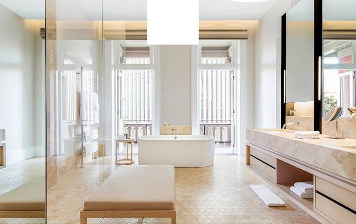 a free standing white bath in a gorgeous bathroom