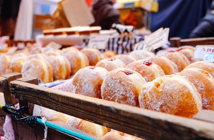 sugar coated jam doughnuts at market