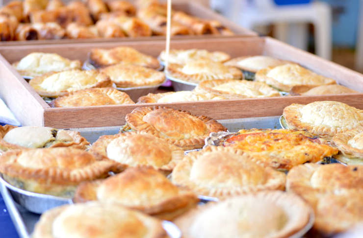 array of freshly made pies