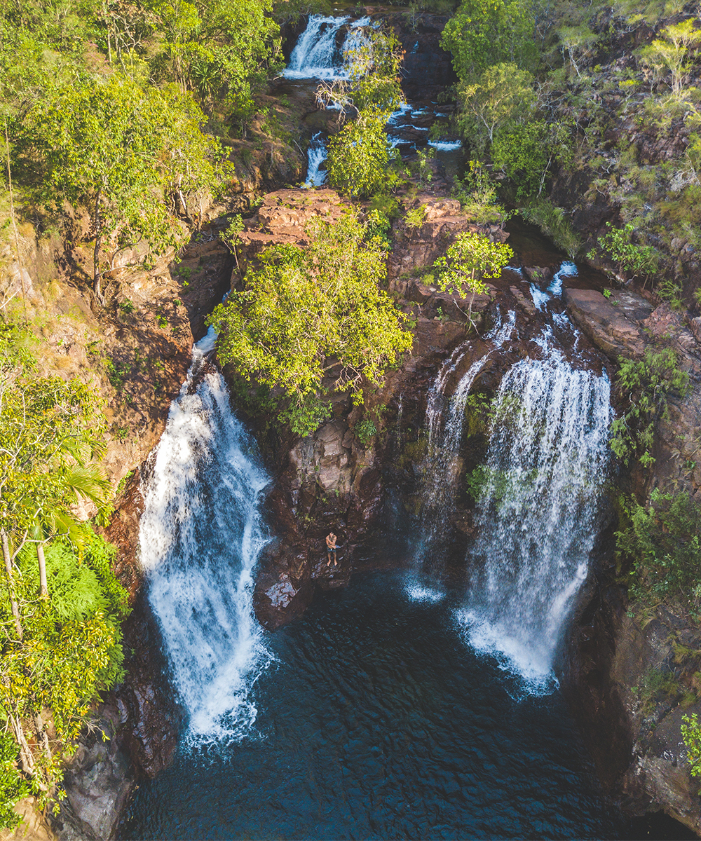 the twin falls of Florence Falls cascade down a rockface