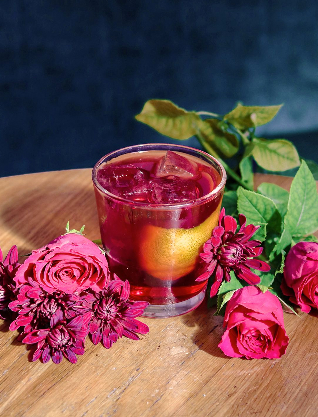 gin negroni on table with flowers