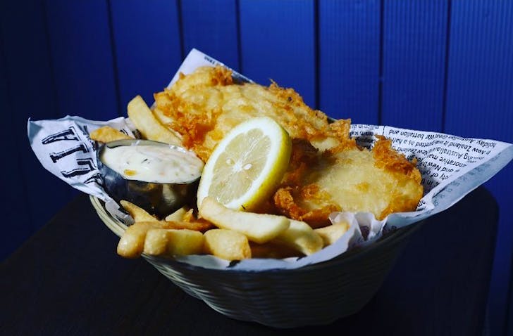 cardboard tray of chips and potato scallops