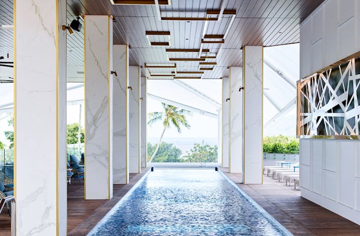 hotel pool with marble columns
