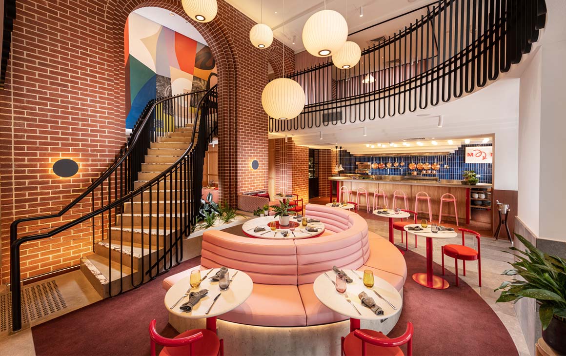 the pink interior of Market and Meander at Hotel Indigo