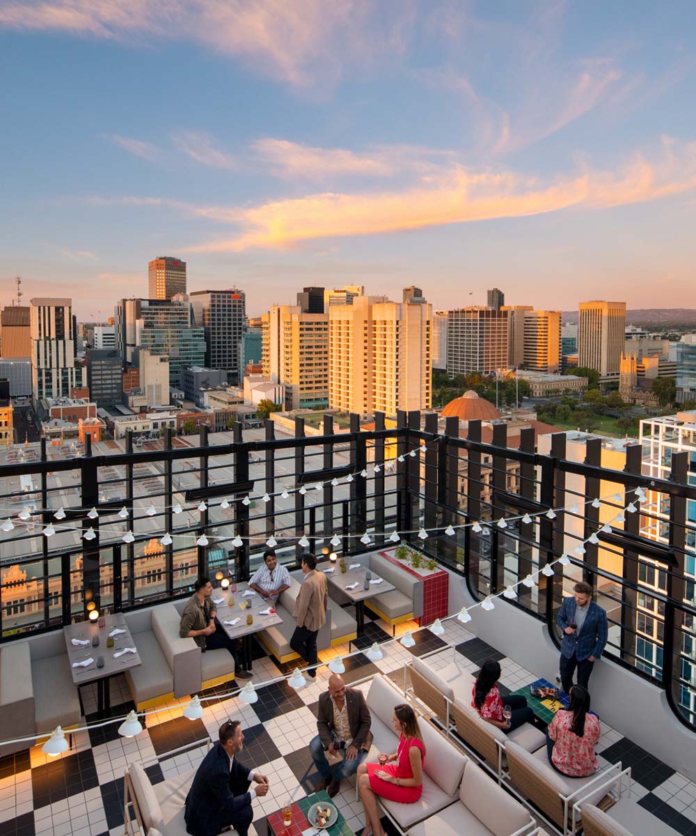 The rooftop of Hotel Indigo at dusk.