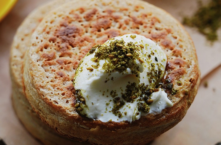 crumpet with condiment on top