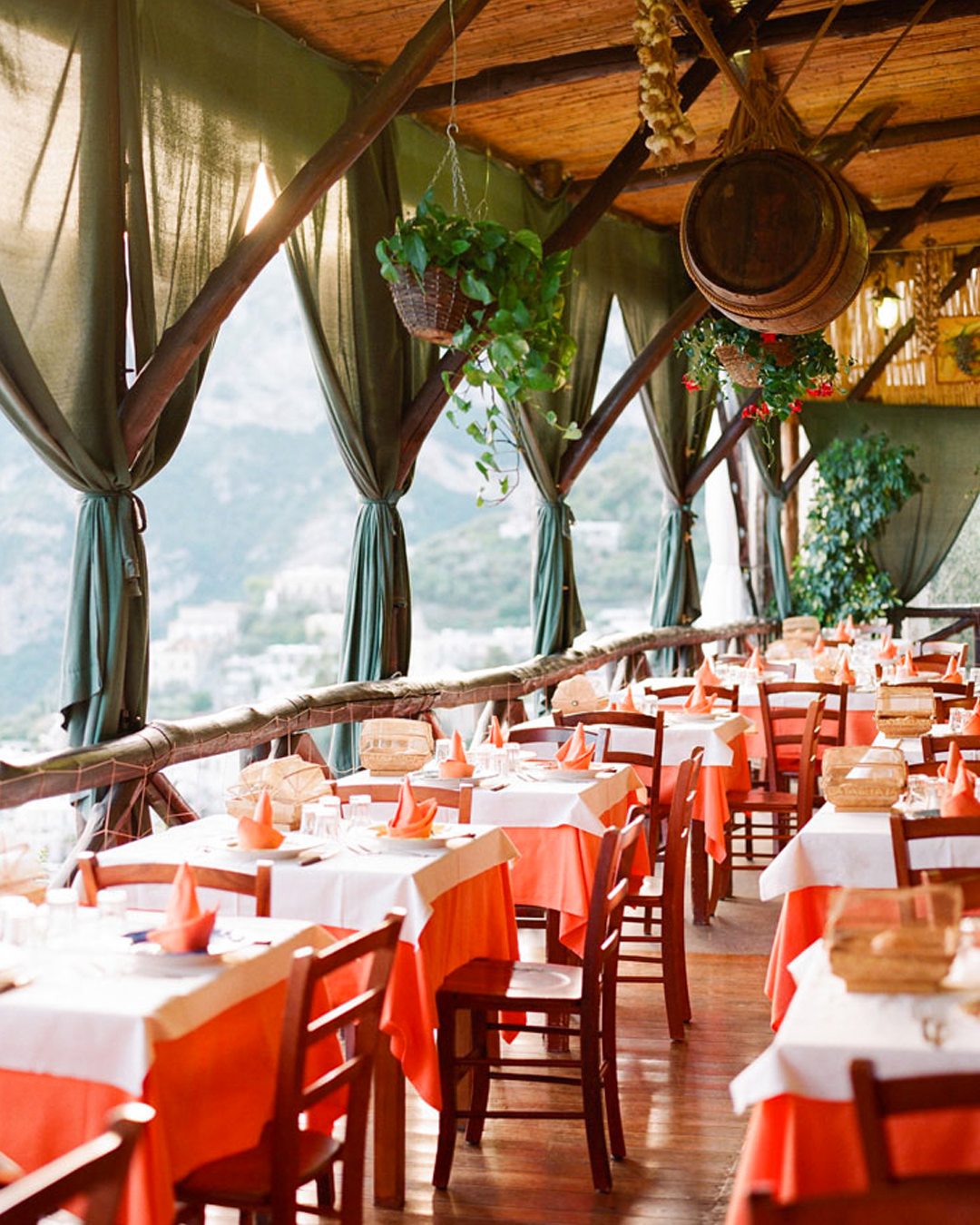 a restaurant with views of positano