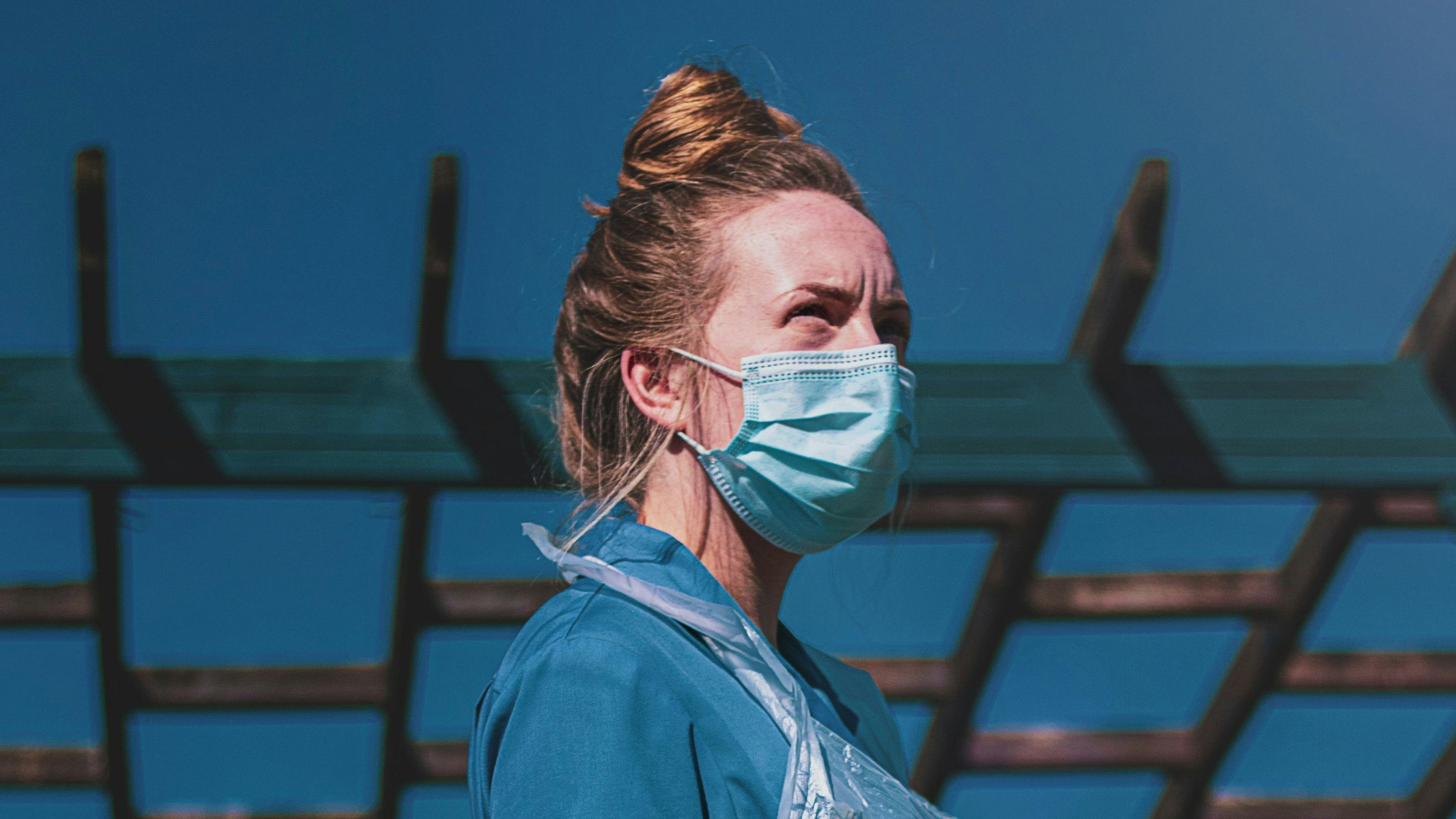 girl wearing protective clothing and a mask