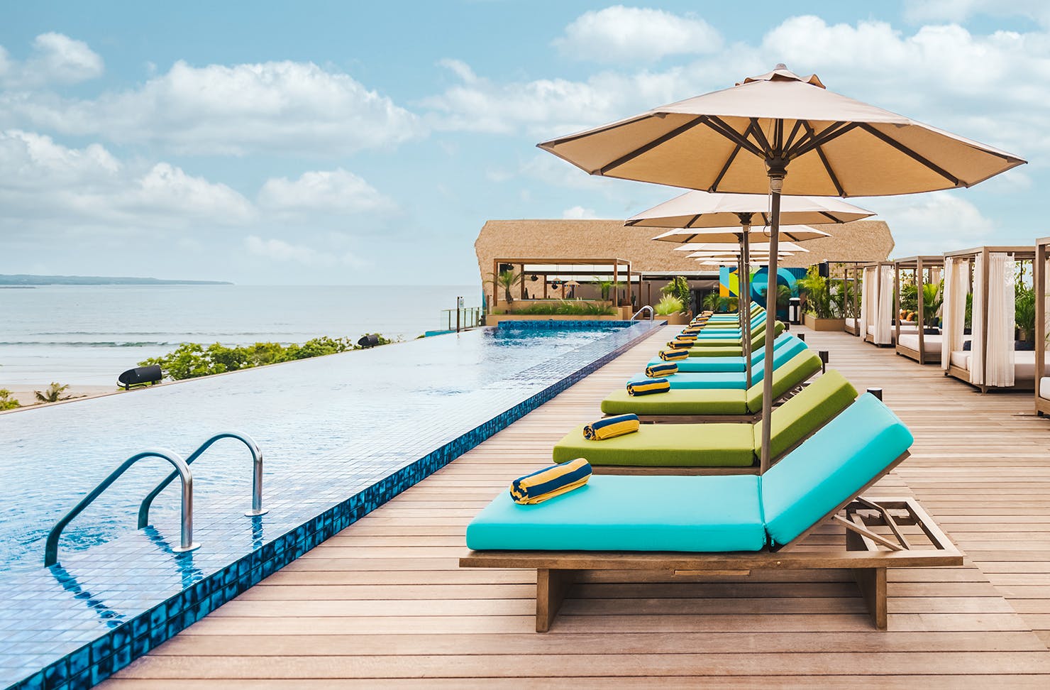 Rooftop infinity pool overlooking Kuta Beach.