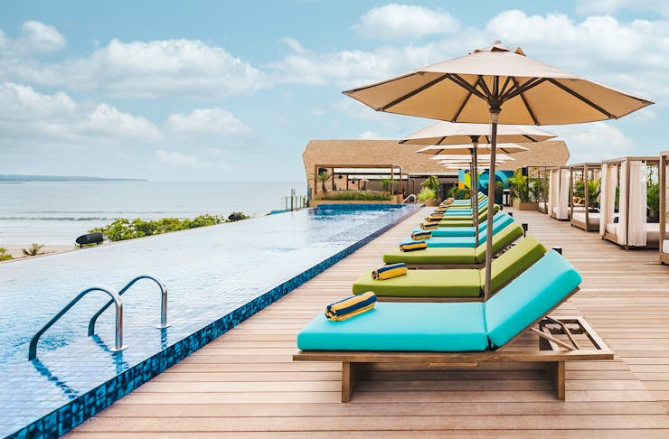 Rooftop infinity pool overlooking Kuta Beach.