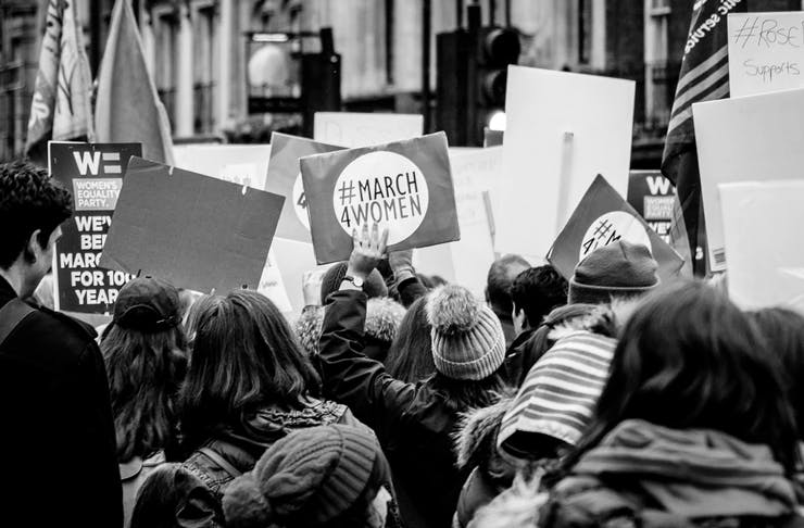 people marching in march 4 justice protest