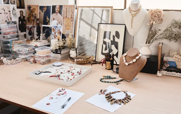 a table of jewellery and tools