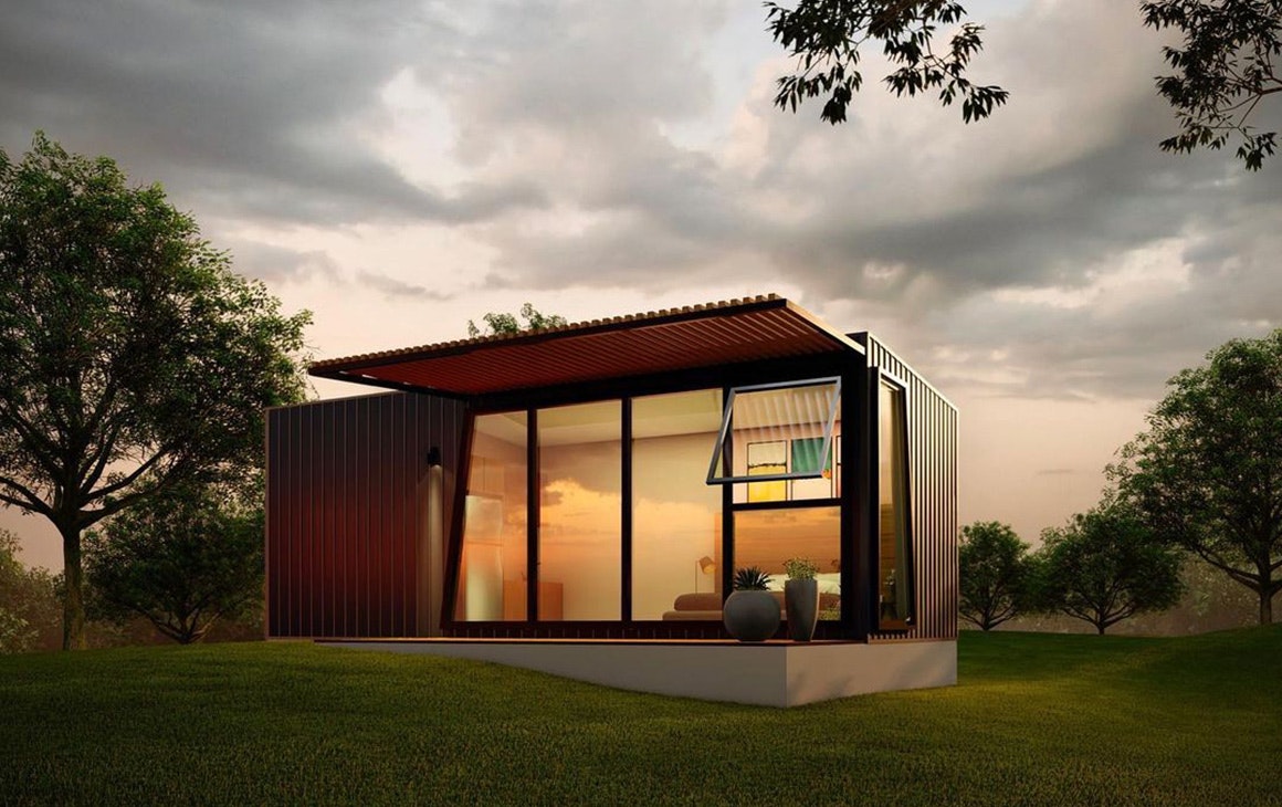 a Modnpod on a grassy hill at dusk.