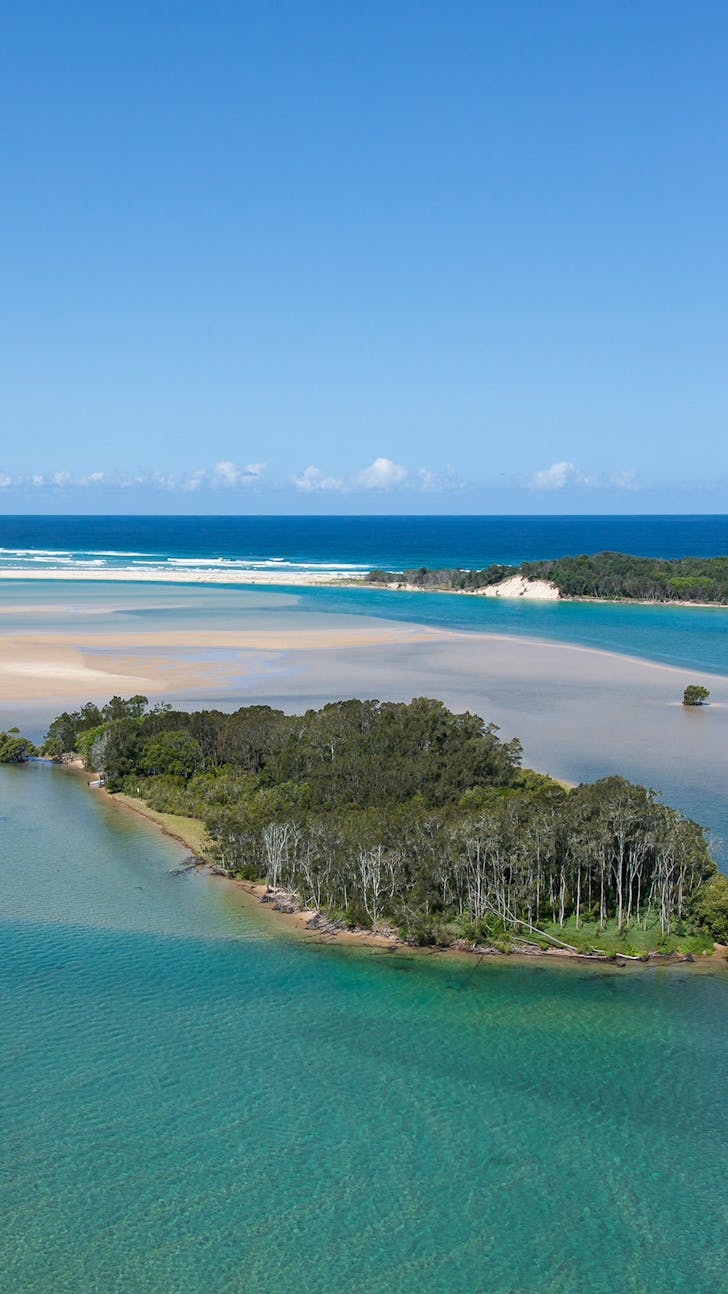 aerial view of rivers meetings the sea