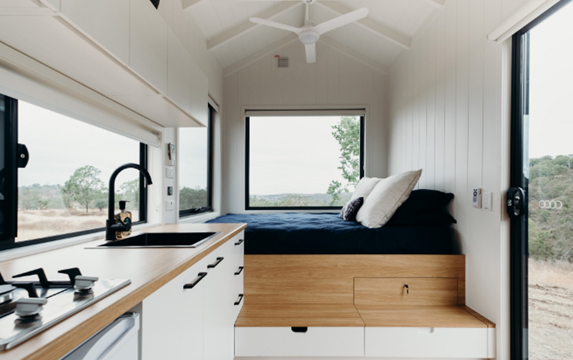 the white timber interior of Norah tiny home.