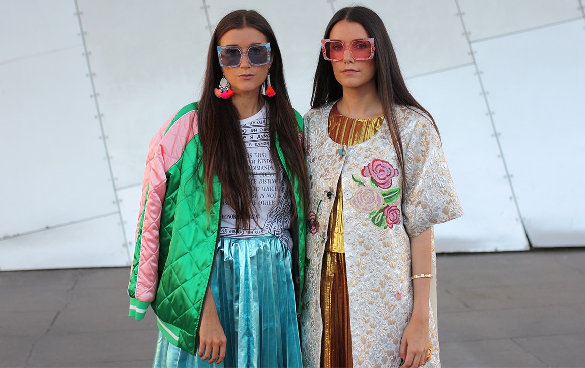 TWOOBS founders in colour jackets and skirts pose.