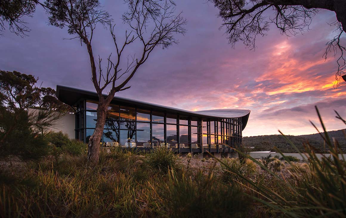 The curved exterior of Saffire at dusk.