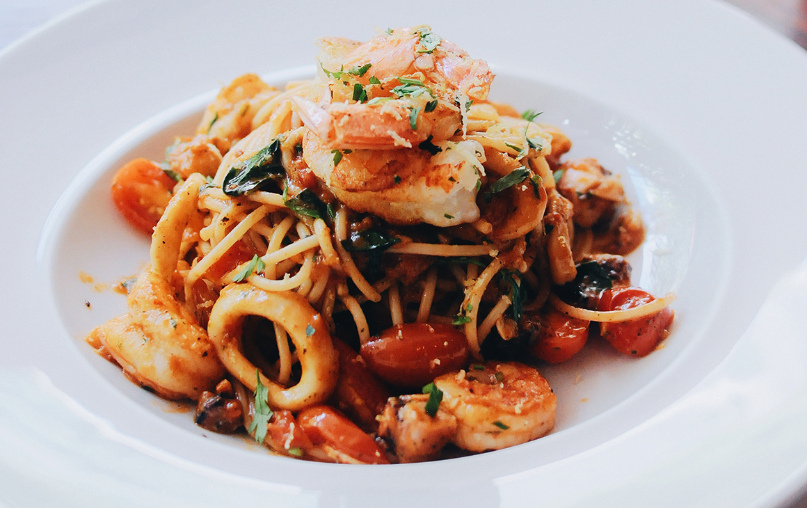 A drool-worthy bowl of seafood pasta.