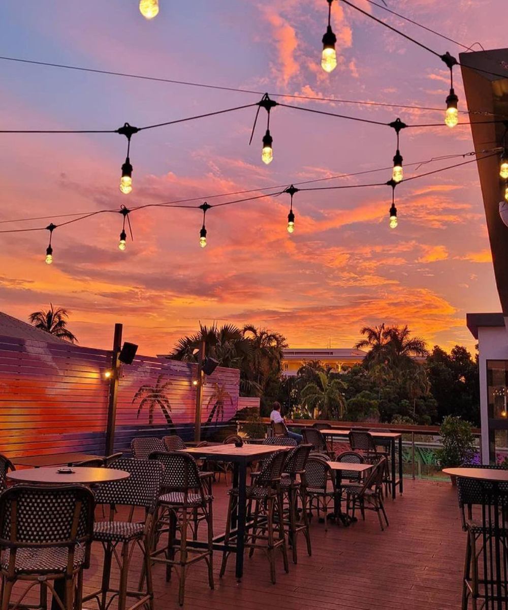 A dreamy pink sunset on the rooftop of Smith Street Social