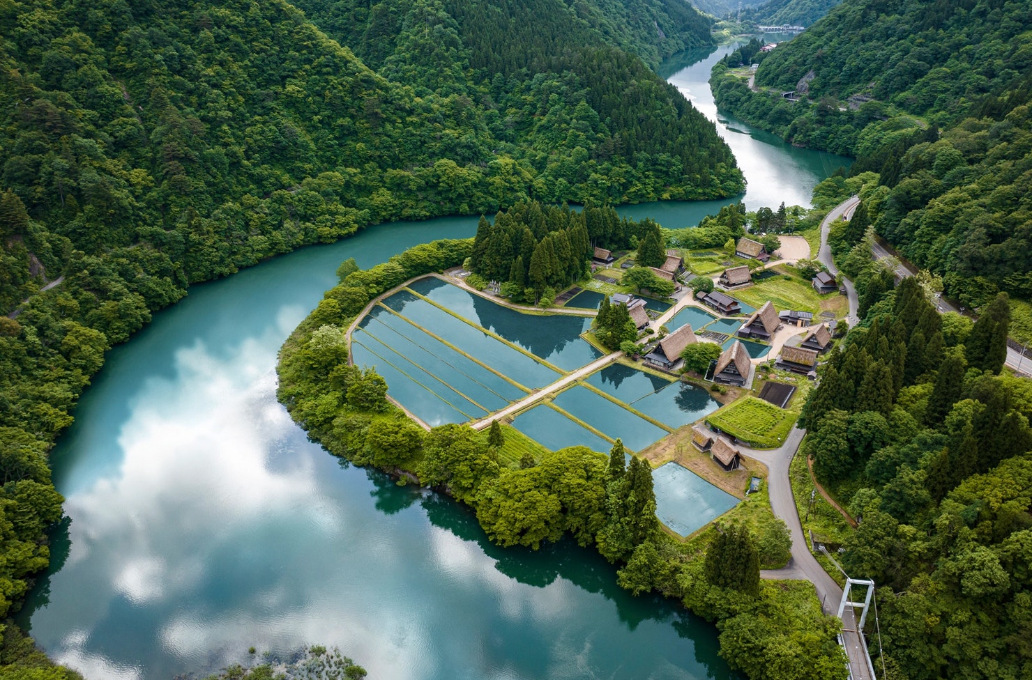 a hidden village in japan next to a river