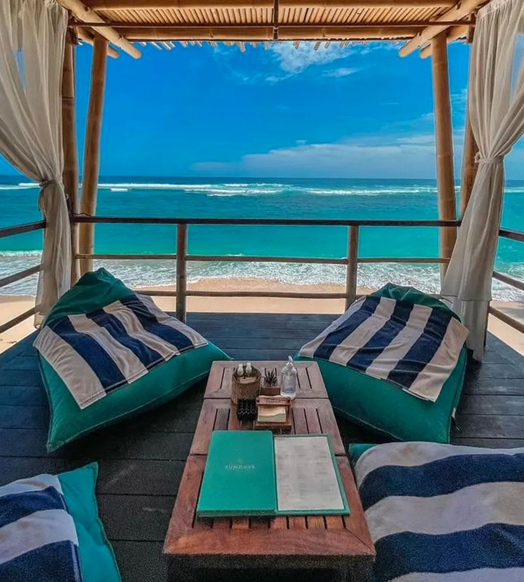 a cabana overlooking the beach on a sunny day
