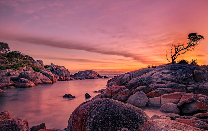 A beautiful pink and orange sunset at the Bay of Fires