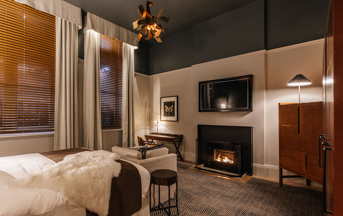 a modern bedroom inside a hotel