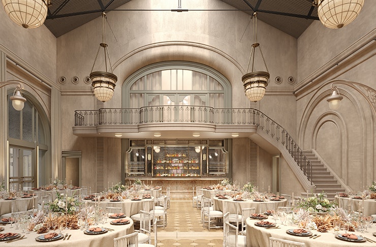 grand ballroom with tables and chandeliers