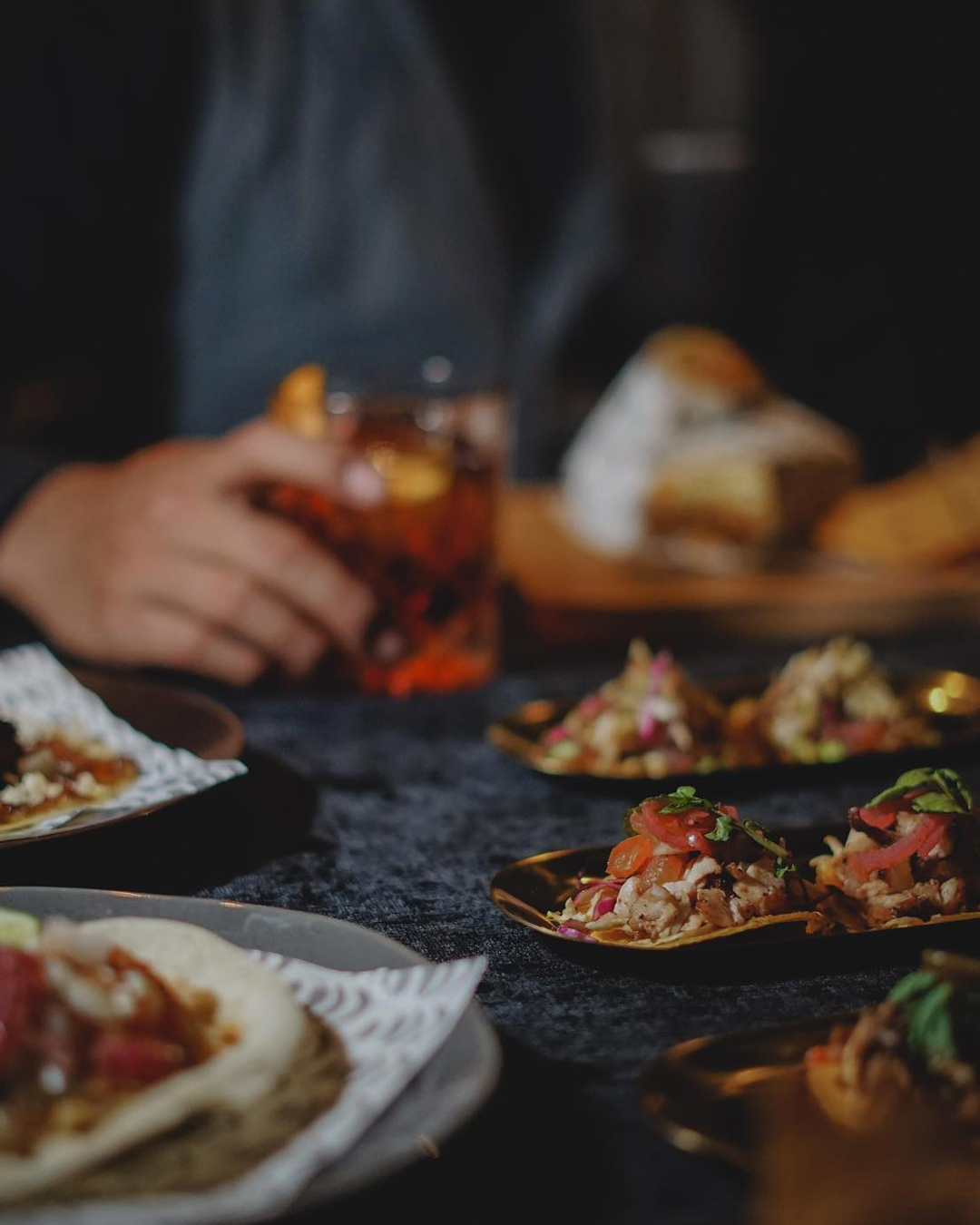 a spread of tacos at a restaurant