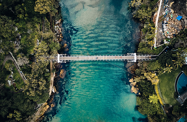 bridge going over harbour beach